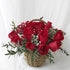 compact basket of Red roses